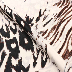 Ivory Cream And Black Animal Pattern Digital Print Satin Fabric